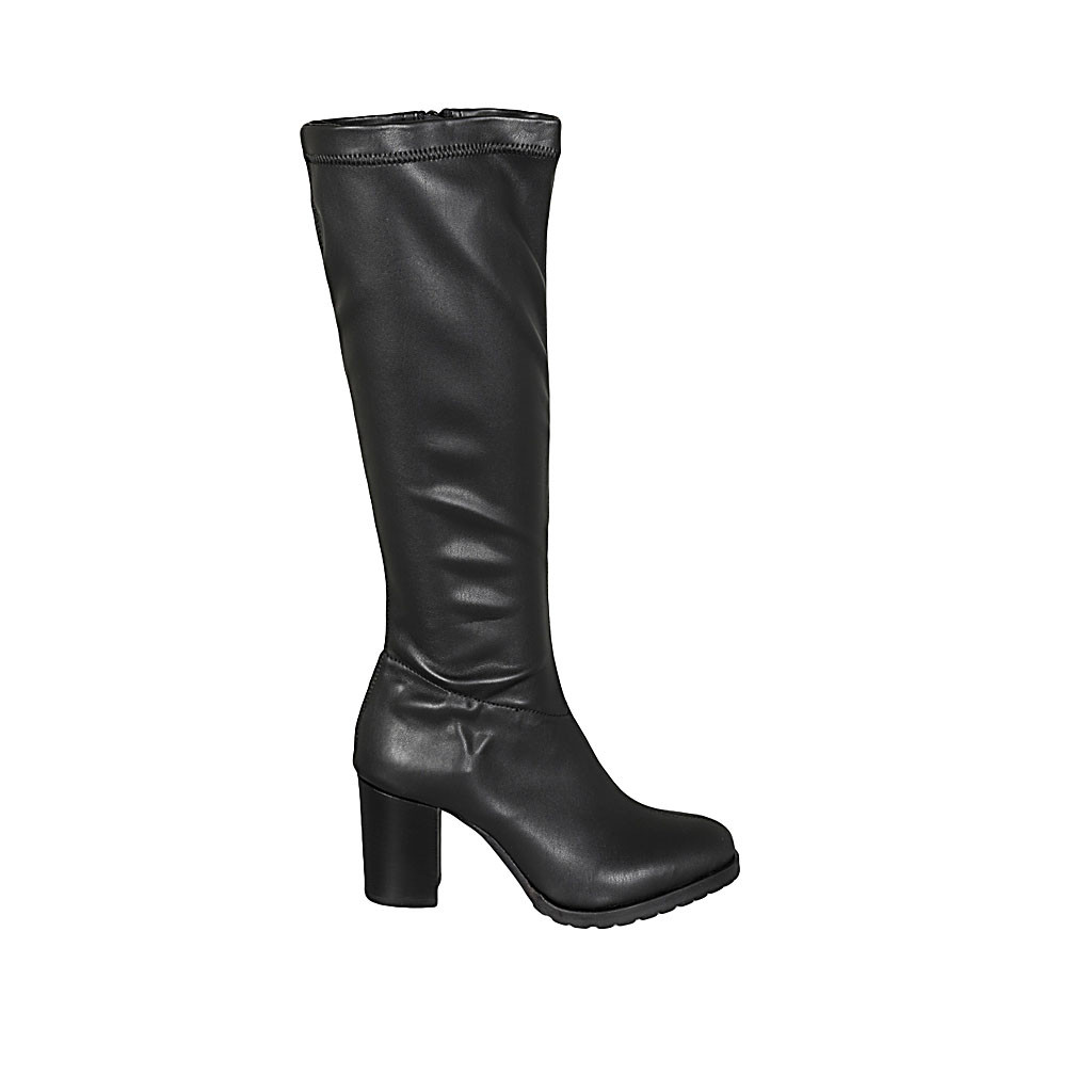 Woman's boot with zipper in black leather and elastic material heel 7