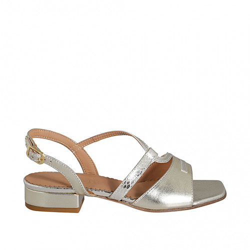 Woman's sandal in platinum laminated...