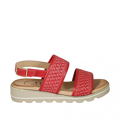 Woman's sandal in red leather and...