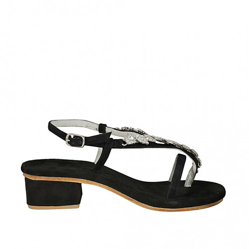 Woman's thong sandal in black suede...