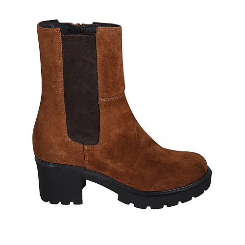 Woman's ankle boot in tan brown suede...