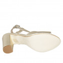 Woman's sandal in platinum-colored laminated lether heel 8 - Available sizes:  32