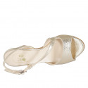 Woman's sandal in platinum-colored laminated lether heel 8 - Available sizes:  32