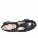 Woman's highfronted shoe with buckle T-strap and captoe in black leather heel 3 - Available sizes:  33