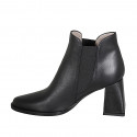 Woman's pointy ankle boot with elastic bands in black leather heel 7 - Available sizes:  43, 46