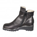 Woman's ankle boot with removable insole, elastic, buckle and zipper in black leather wedge heel 4 - Available sizes:  45