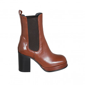 Woman's ankle boot in cognac brown leather with elastic bands and platform heel 8 - Available sizes:  42