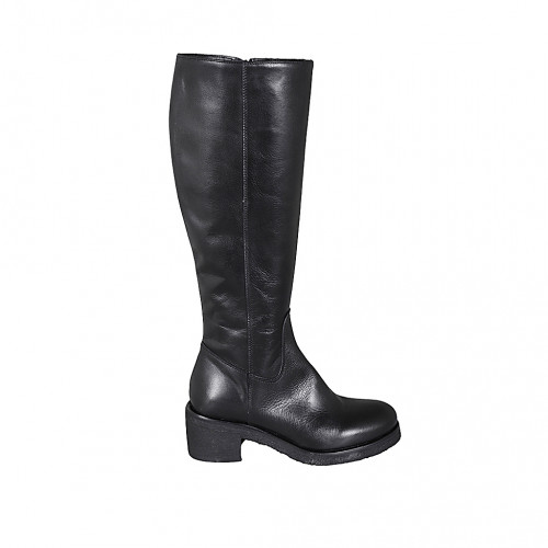 Woman's boot with zipper and rounded...