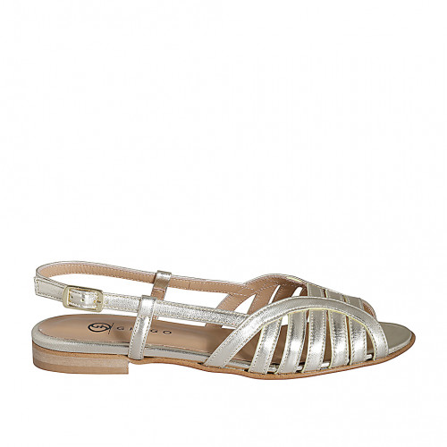 Woman's sandal in platinum laminated...