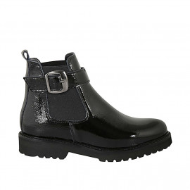 Woman's ankle boot with elastic bands and buckle in black patent leather heel 3 - Available sizes:  32