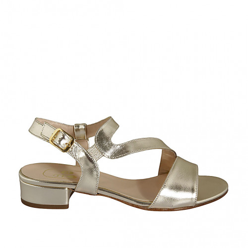 Woman's sandal in platinum laminated...