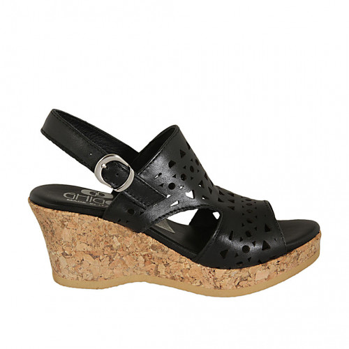 Woman's sandal in black pierced...